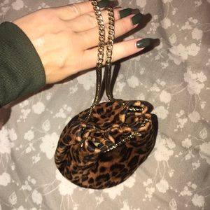 SUEDE CHEETAH BUCKET BAG